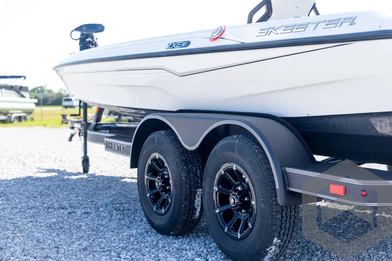 Slide: The Image of 2026 Skeeter ZXE21 boat on trailer, showcasing sleek design and modern features. - 29