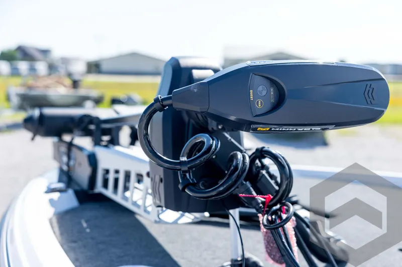 Slide: The Image of 2026 Skeeter ZXE21 boat with advanced trolling motor, outdoor setting. - 34