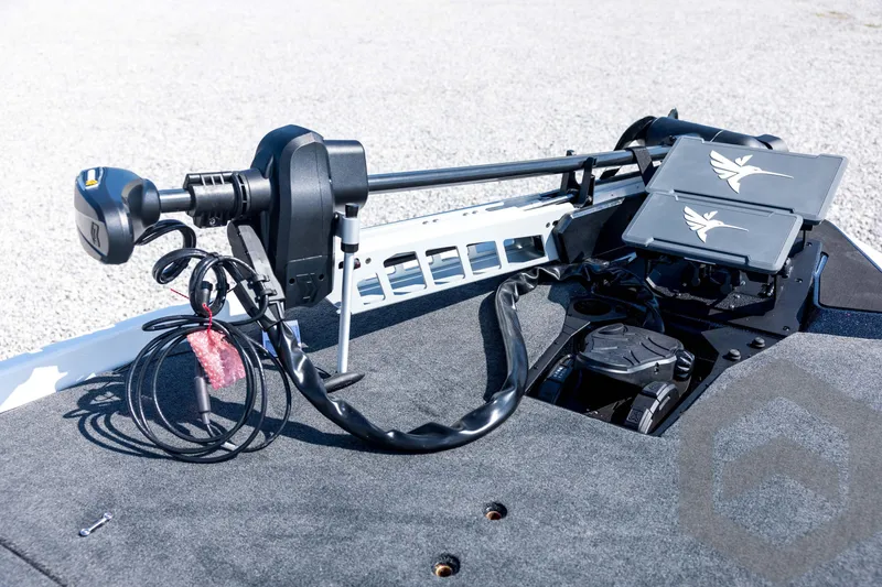 Slide: The Image of 2026 Skeeter ZXE21 boat deck with advanced trolling motor and control panels. - 40