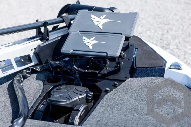 Slide: The Image of 2026 Skeeter ZXE21 boat dashboard with advanced control panels and sleek design. - 41