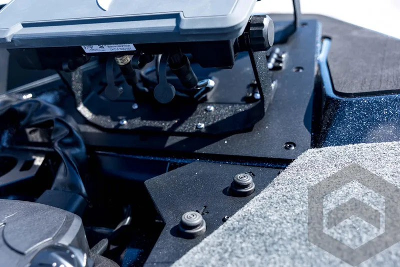 Slide: The Image of Close-up of 2026 Skeeter ZXE21 boat dashboard with electronic controls. - 43