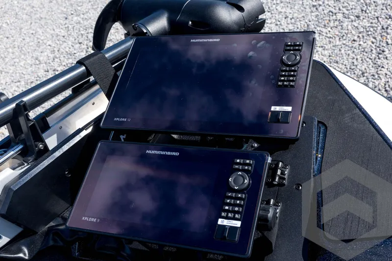 Slide: The Image of Two Humminbird Xplore fish finders on a 2026 Skeeter ZXE21 boat dashboard. - 44