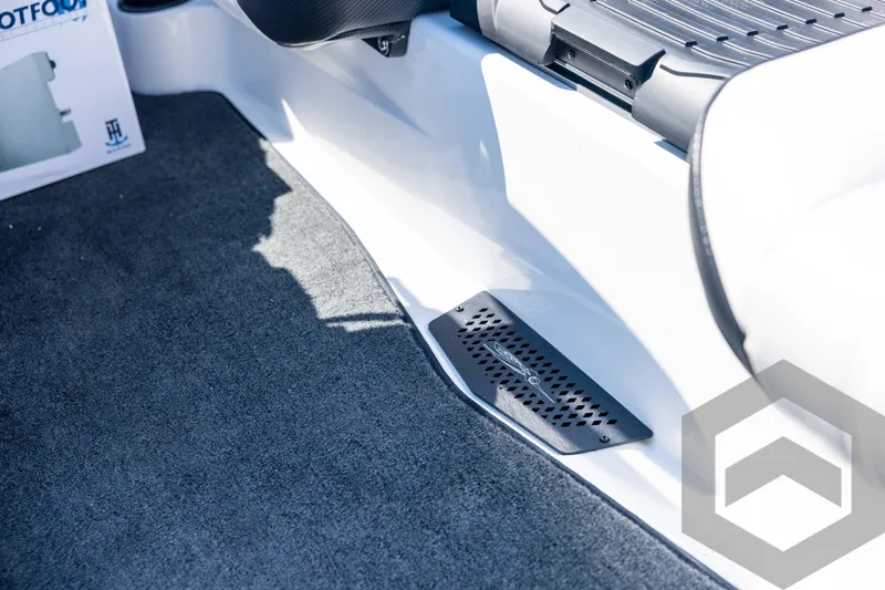 Slide: The Image of Interior of 2026 Skeeter ZXE21 boat, featuring carpeted flooring and sleek design elements. - 59