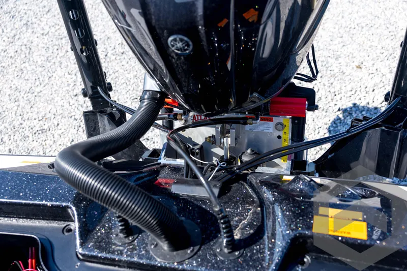 Slide: The Image of 2026 Skeeter ZXE21 boat engine close-up with detailed wiring and components. - 77