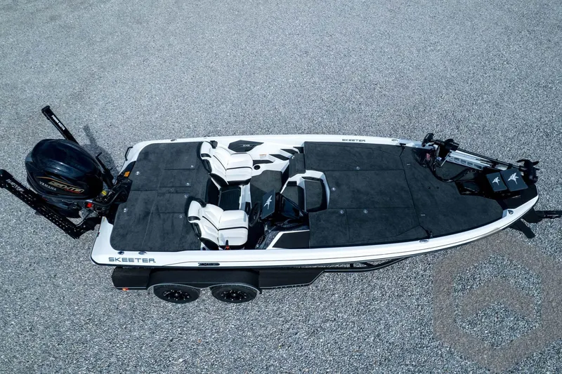 Slide: The Image of 2026 Skeeter ZXE21 fishing boat, aerial view, featuring dual seats and Yamaha engine. - 85