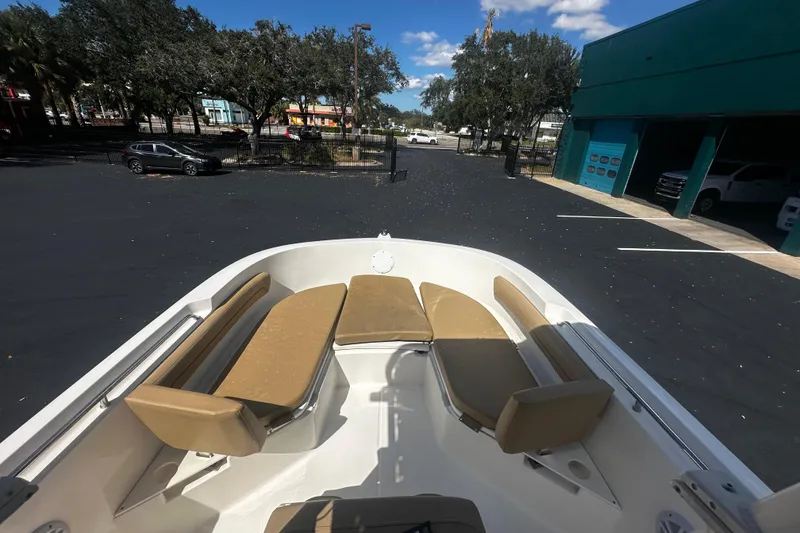 Slide: The Image of Bow seating area of 2022 Trophy T22 boat in a parking lot. - 5