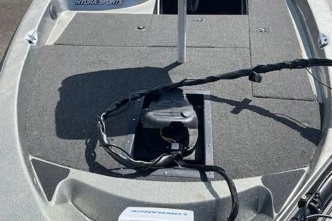 Slide: The Image of 1996 Hydra-Sports 175E boat deck with fishing equipment and storage compartments. - 4