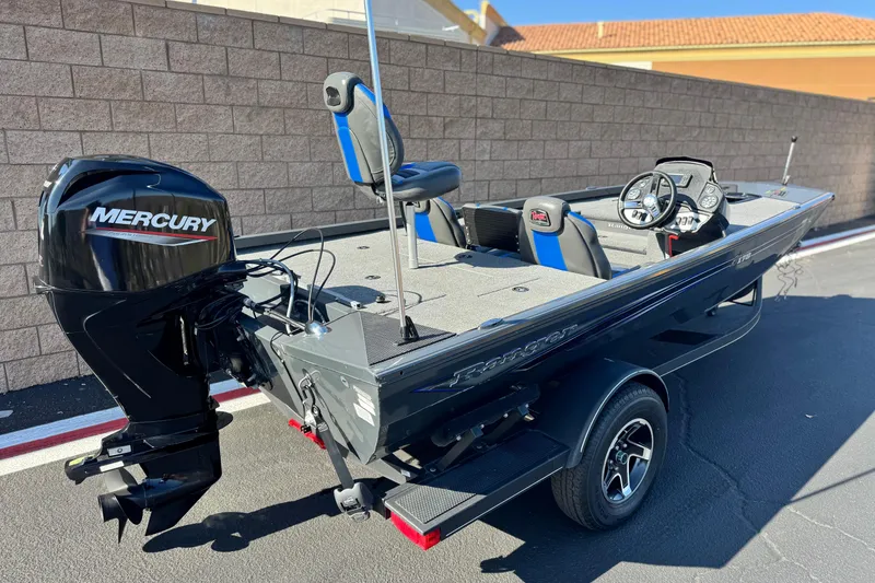Slide: The Image of 2021 Ranger RT178 boat with Mercury engine, parked on a trailer. - 5