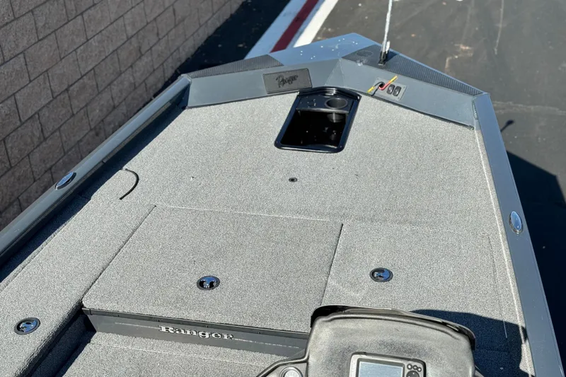 Slide: The Image of 2021 Ranger RT178 boat deck with storage compartments and control panel. - 7
