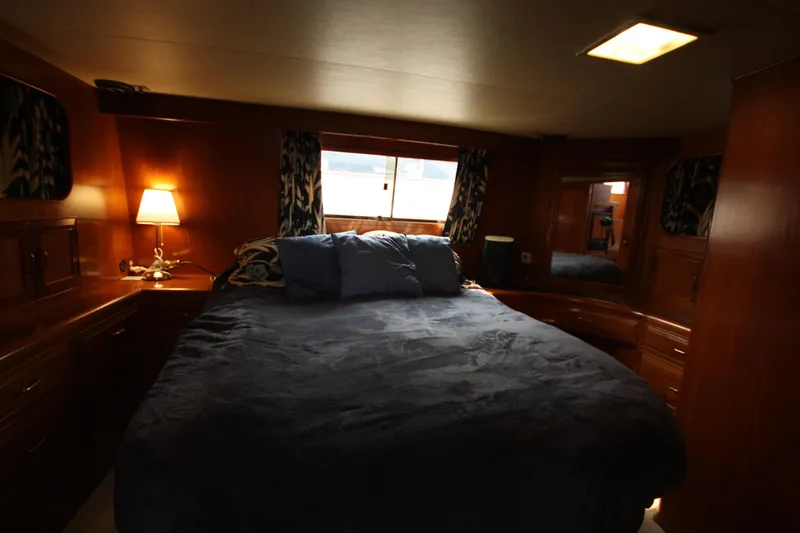 Slide: The Image of Luxurious bedroom interior of 1989 Ocean Alexander 420 Cockpit Motor Yacht. - 29