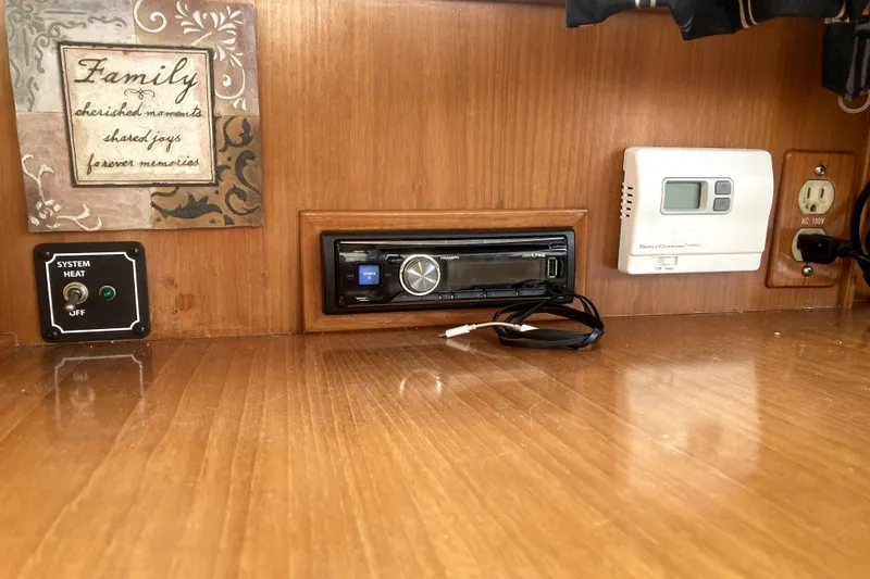 Slide: The Image of Control panel and decor inside 1989 Ocean Alexander 420 Cockpit Motor Yacht. - 40