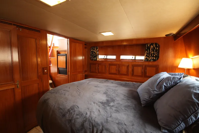 Slide: The Image of Luxurious cabin interior of 1989 Ocean Alexander 420 Cockpit Motor Yacht. - 30