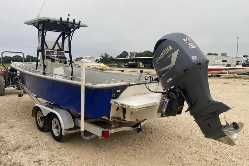 Slide: The Image of 2015 Blazer Bay 2400 boat with Yamaha V8 engine on trailer. - 3