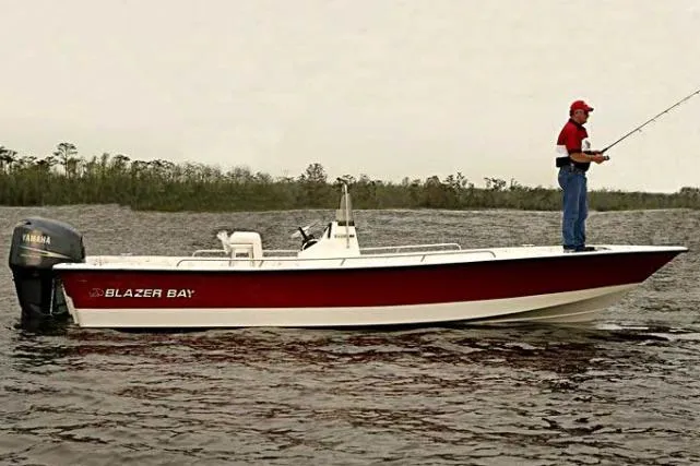 Slide: The Image of Manufacturer Provided Image: 2015 Blazer Bay 2400 boat with Yamaha motor on a lake. - 9