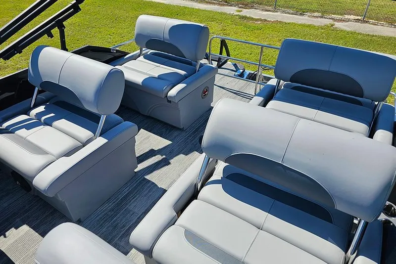 Slide: The Image of 2026 Bentley Pontoons Legacy 223 Tritoon with luxurious seating on deck. - 12