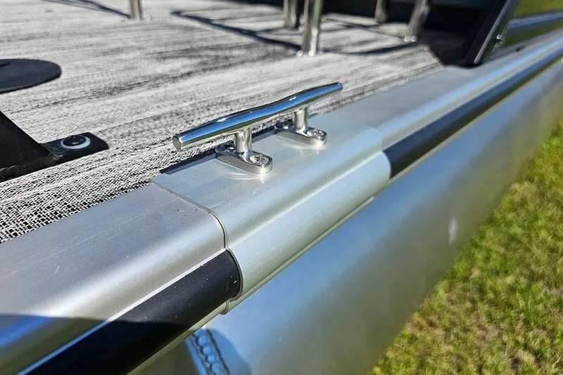 Slide: The Image of 2026 Bentley Pontoons Legacy 223 Tritoon deck detail with cleat. - 26