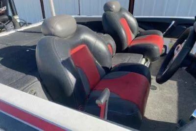 Slide: The Image of 2012 Skeeter FX20 boat interior with black and red seats. - 6