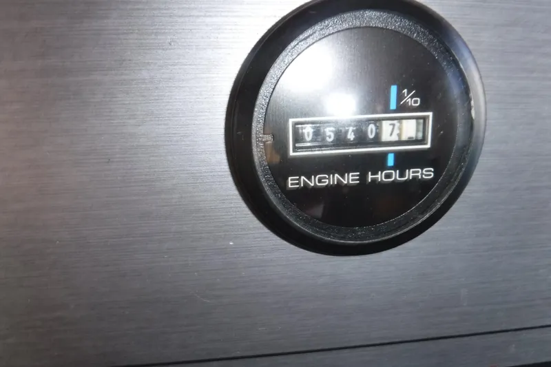 Slide: The Image of Engine hour meter showing 540.7 hours on 1994 Gibson 41 Classic Houseboat. - 31