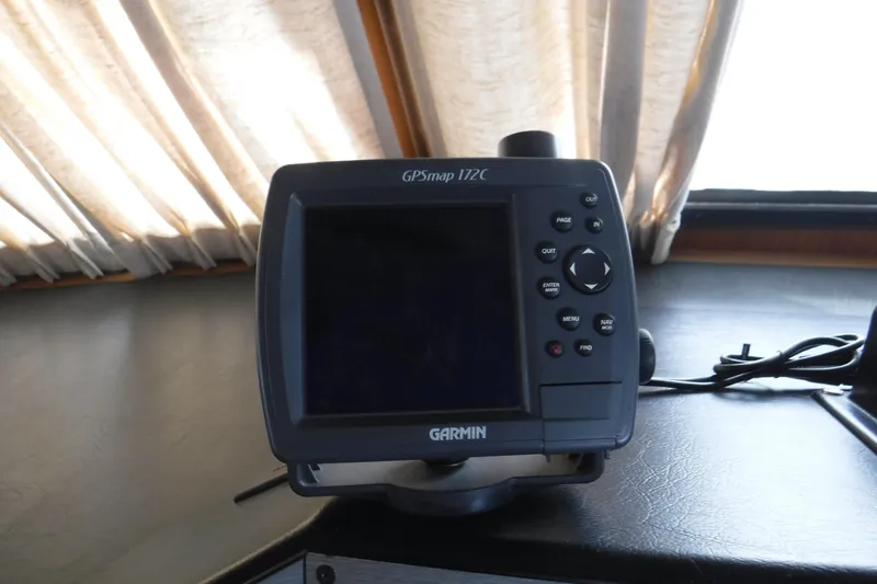 Slide: The Image of Garmin GPSmap 172C device on 1994 Gibson 41 Classic Houseboat dashboard. - 34