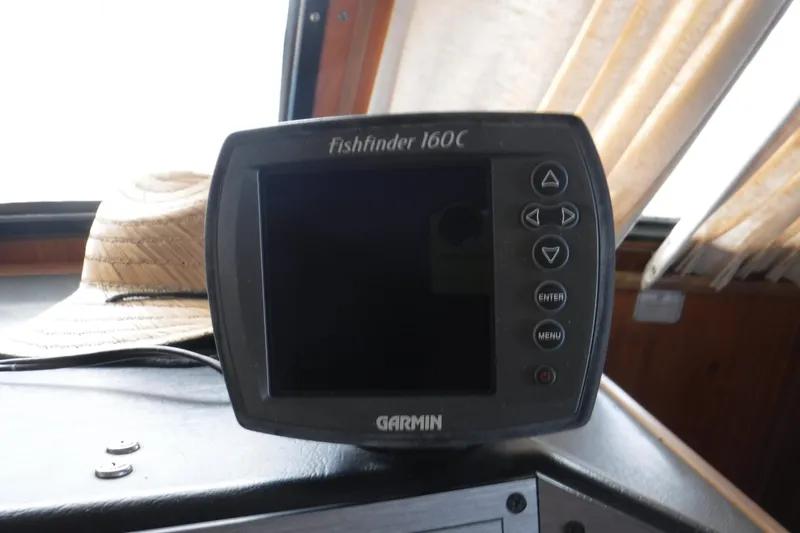 Slide: The Image of Garmin Fishfinder 160C on 1994 Gibson 41 Classic Houseboat dashboard. - 35