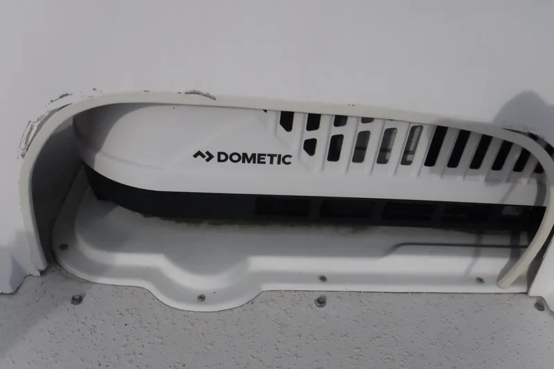 Slide: The Image of Dometic appliance on 1994 Gibson 41 Classic Houseboat, white vent cover visible. - 46