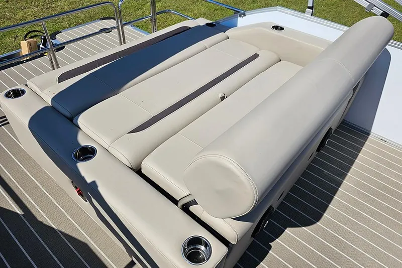 Slide: The Image of 2026 Bentley Pontoons 243 Legacy Swingback interior with luxurious seating and modern design. - 13