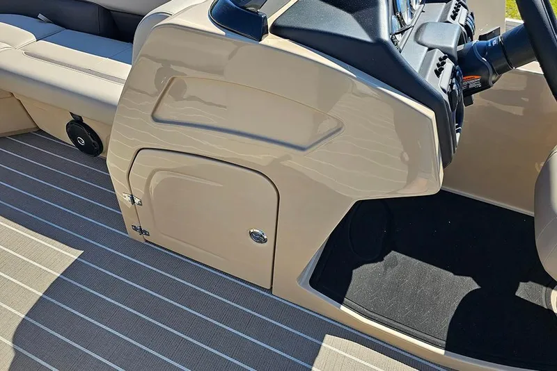 Slide: The Image of 2026 Bentley Pontoons 243 Legacy Swingback Sport3 interior with steering console and seating. - 20