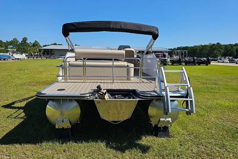 Slide: The Image of 2026 Bentley Pontoons 243 Legacy Swingback (Sport3) on grass, side view, sunny day. - 8
