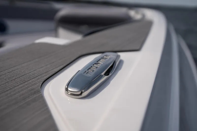 Slide: The Image of Close-up of 2026 Fountain 43 SCX boat detail with sleek design and branding. - 25
