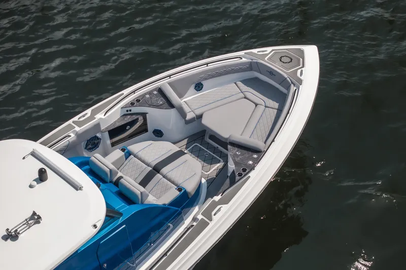 Slide: The Image of 2026 Fountain 43 SCX boat with sleek seating on calm water. - 38