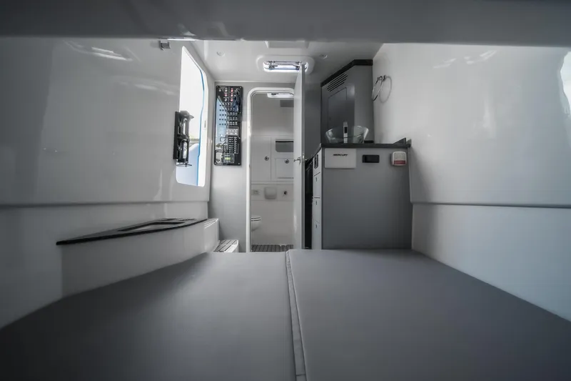 Slide: The Image of Interior of 2026 Fountain 43 SCX boat, featuring modern cabin amenities and sleek design. - 40