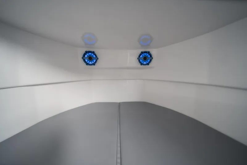 Slide: The Image of Interior cabin of 2026 Fountain 43 SCX boat with modern design and blue accents. - 41