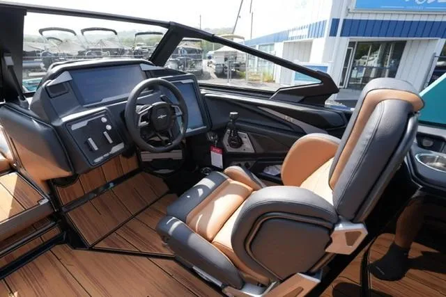 Slide: The Image of 2026 Supra SL boat interior with modern dashboard and luxurious seating. - 7