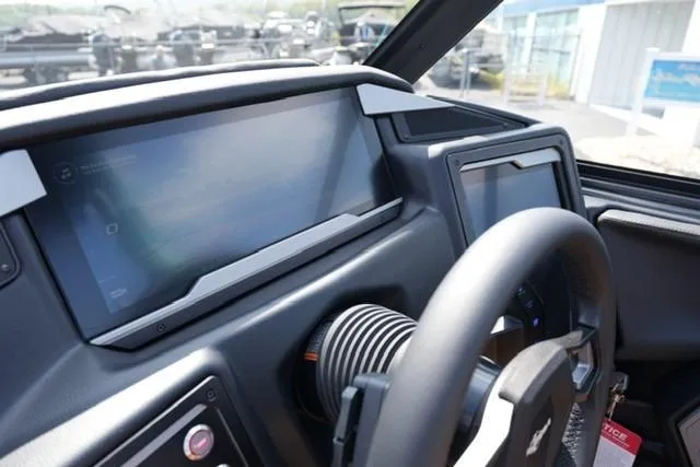 Slide: The Image of 2026 Supra SL dashboard with modern digital displays and sleek steering wheel design. - 9
