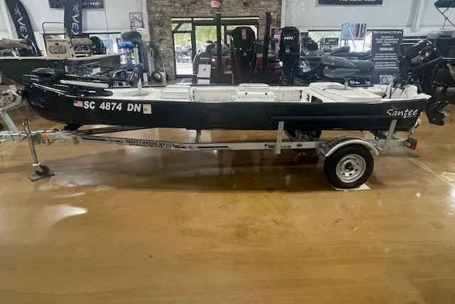 The Image of 2020 Santee 160TS boat on trailer in showroom, side view. - 1