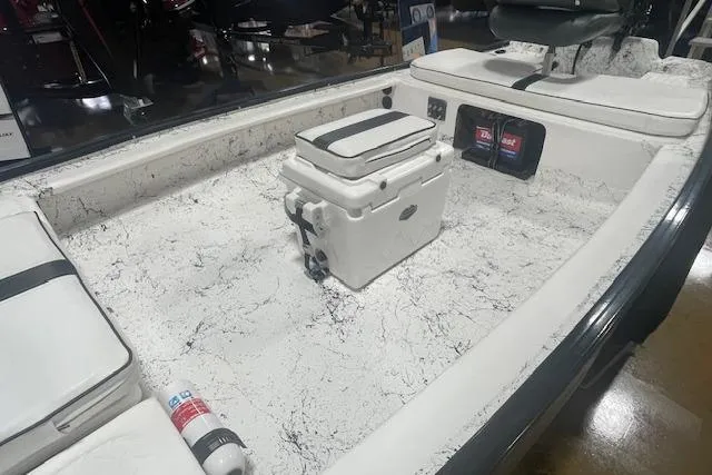 Slide: The Image of Interior of a 2020 Santee 160TS boat with seating and storage compartments. - 4