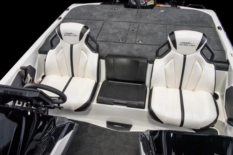 Slide: The Image of Manufacturer Provided Image: 2026 Skeeter ZXE21 boat interior with dual white seats and steering console. - 13