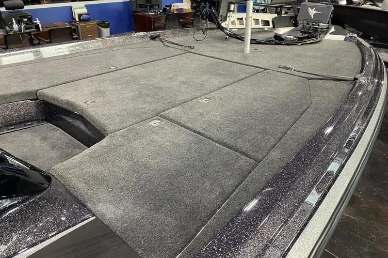 Slide: The Image of 2026 Skeeter ZXE21 boat deck with gray carpet and modern equipment. - 7