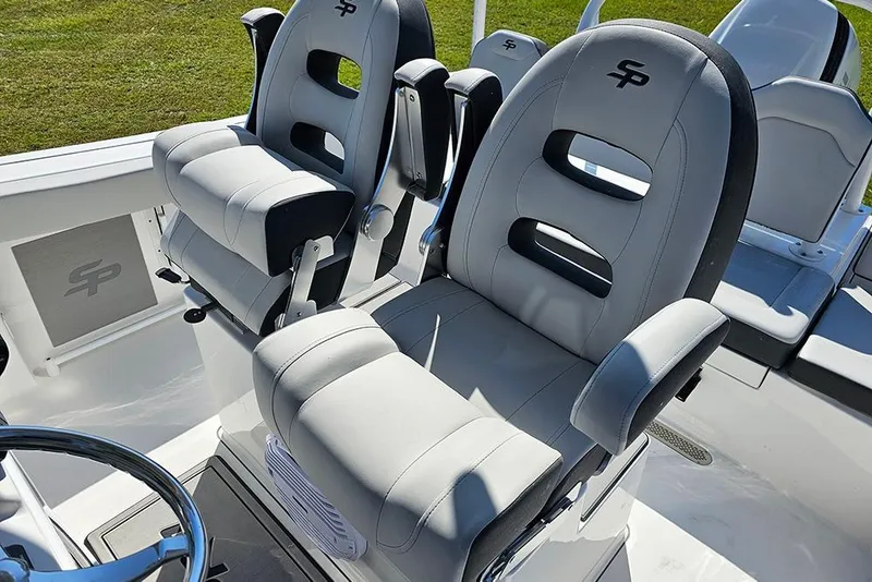 Slide: The Image of 2026 Sea Pro 245 Sandbar boat seats with logo, featuring modern design and comfort. - 16