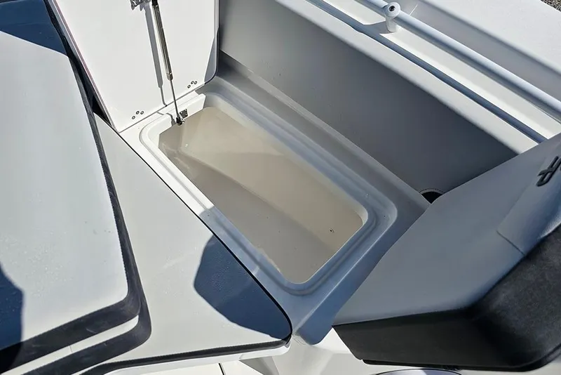 Slide: The Image of Open storage compartment on 2026 Sea Pro 245 Sandbar boat. - 25