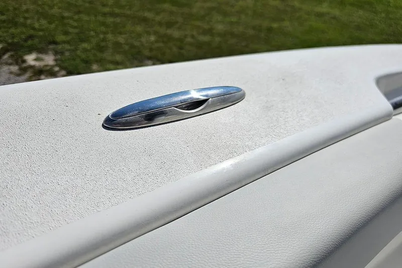 Slide: The Image of Close-up of 2026 Sea Pro 245 Sandbar boat cleat on white surface. - 32