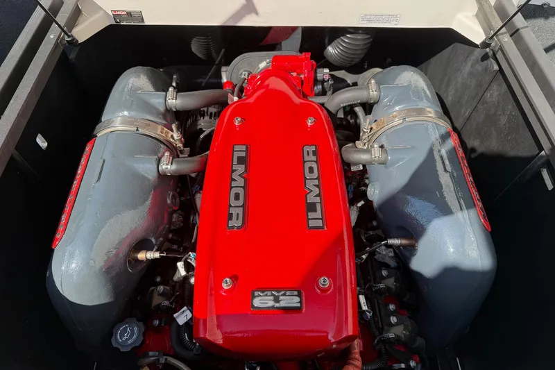 Slide: The Image of 2015 MasterCraft X30 Ilmor MV8 6.2 engine, red and gray components, top view. - 20