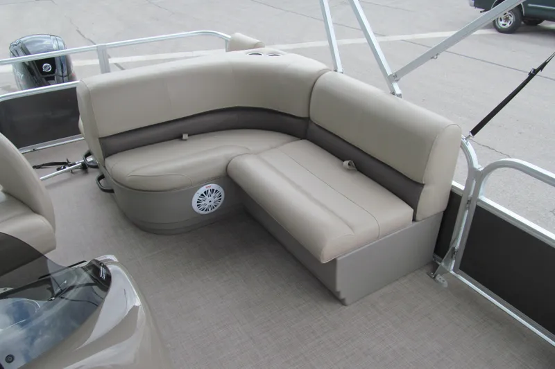 Slide: The Image of 2023 Sun Tracker Party Barge 18 DLX with beige seating and speaker system. - 9