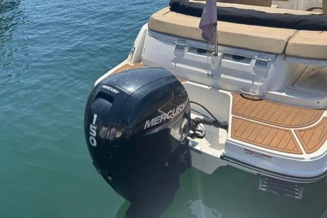 Slide: The Image of 2023 Bayliner VR5 Bowrider OB with Mercury 150 outboard engine on water. - 4