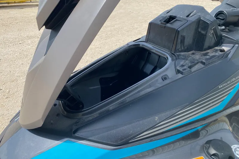 Slide: The Image of 2023 Yamaha WaveRunner VX Cruiser storage compartment open, showcasing interior space. - 8