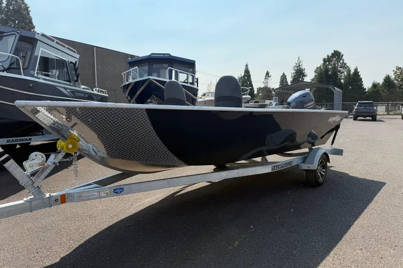The Image of 2026 Fish Rite Angler 18 boat on trailer, parked outdoors. - 0