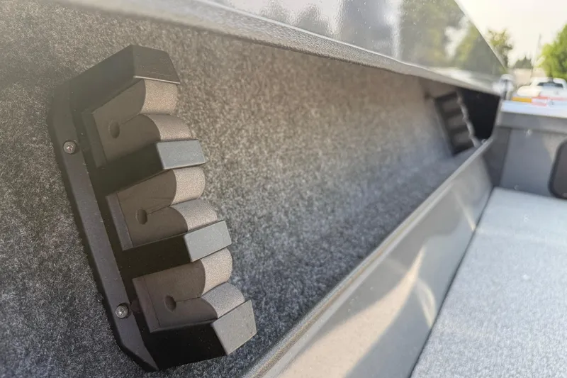 Slide: The Image of 2026 Fish Rite Angler 18 boat interior with two cushioned seats and diamond plate bases. - 6