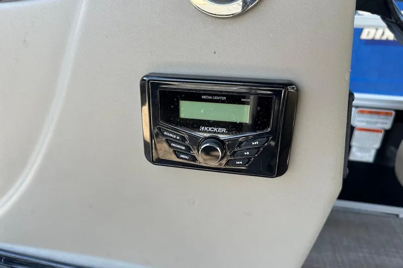 Slide: The Image of Kicker media center on 2022 Sun Tracker Bass Buggy 18 DLX boat dashboard. - 20