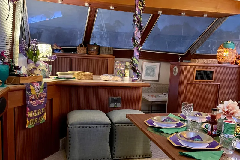 Slide: The Image of 1988 Tollycraft 40 Sundeck Motor Yacht interior with festive Mardi Gras decorations. - 25