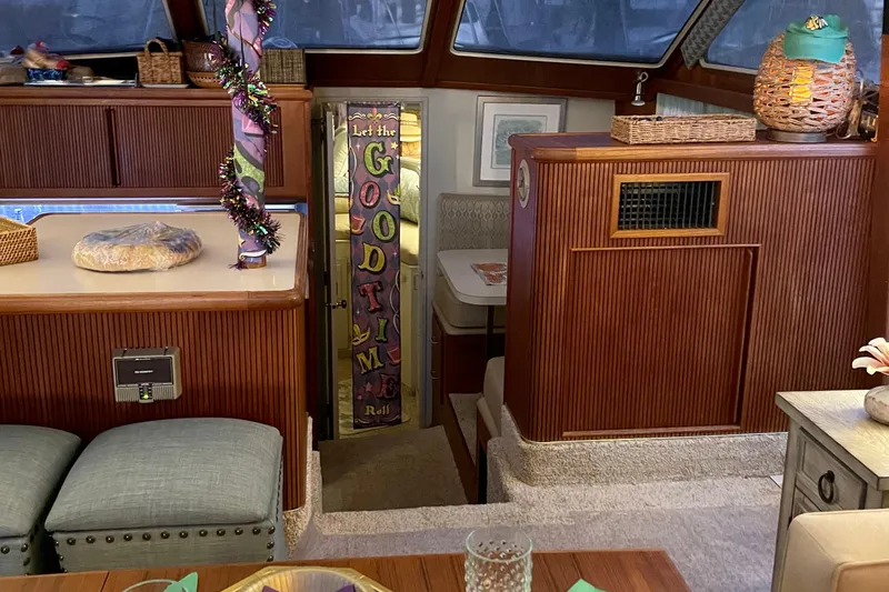 Slide: The Image of Interior of 1988 Tollycraft 40 Sundeck Motor Yacht with festive decor and cozy seating. - 26